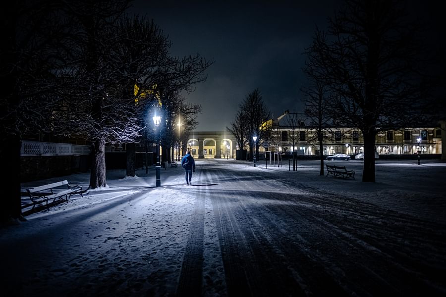 Person enjoying sushi with chopsticks