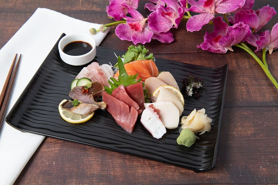 Assorted sashimi platter with various types of fresh raw fish