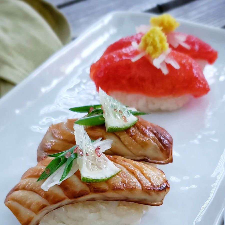Close-up view of Nigiri sushi with fresh fish topping on sushi rice