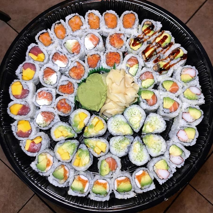A traditional sushi platter featuring a variety of sushi types