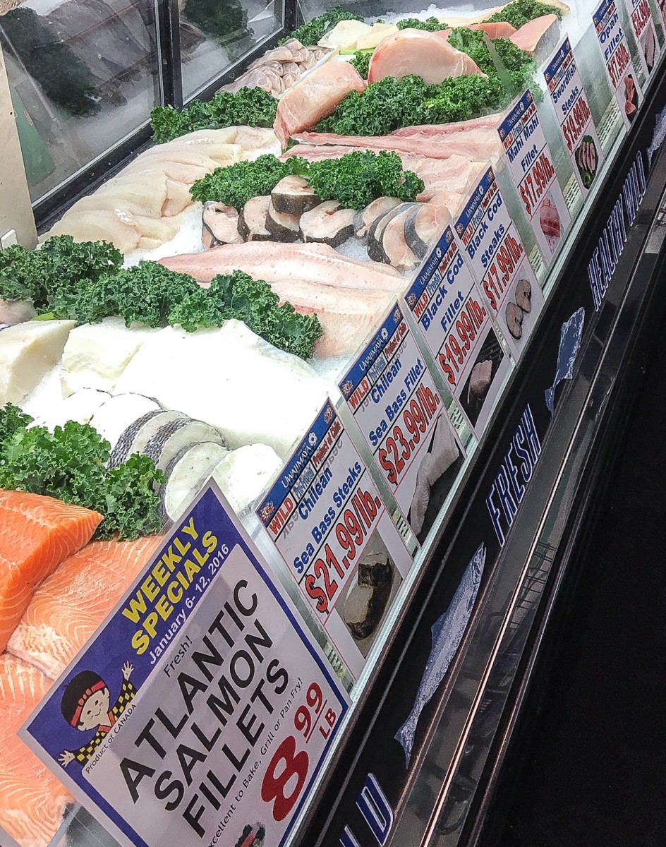 Fresh sushi-grade fish counter at Uwajimaya supermarket in Seattle